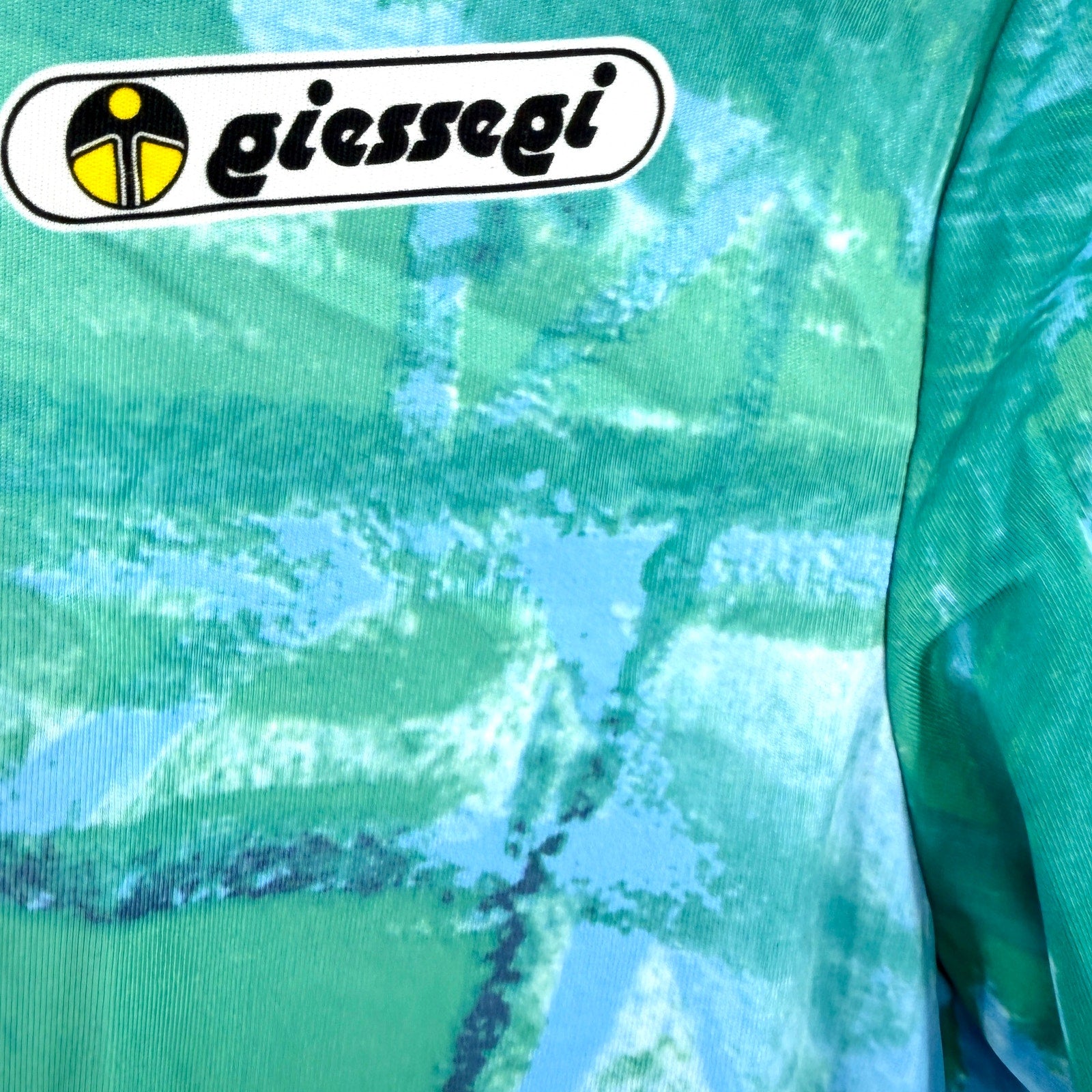 Vintage 90s Giessegi Teal Blue Abstract Print Half-Zip Cycling Jersey