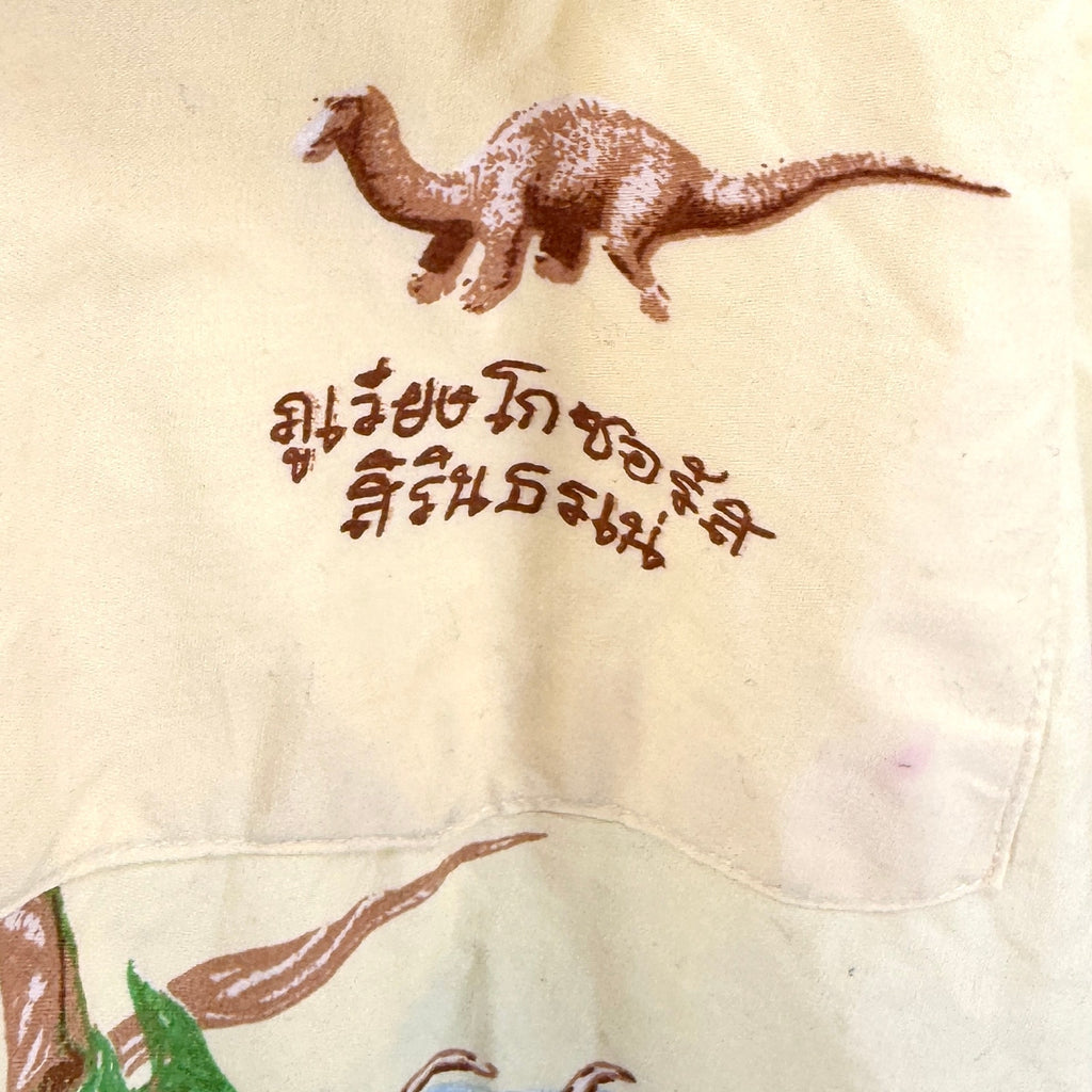 Vintage 90s Pastel Yellow 100% Cotton Dinosaur Border Print Short Sleeve Shirt