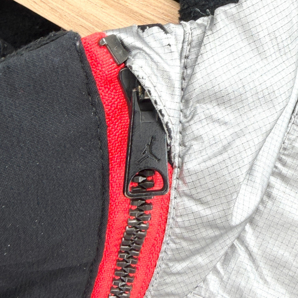 Air Jordan Black Silver Asymmetrical Zip Cropped Track Jacket