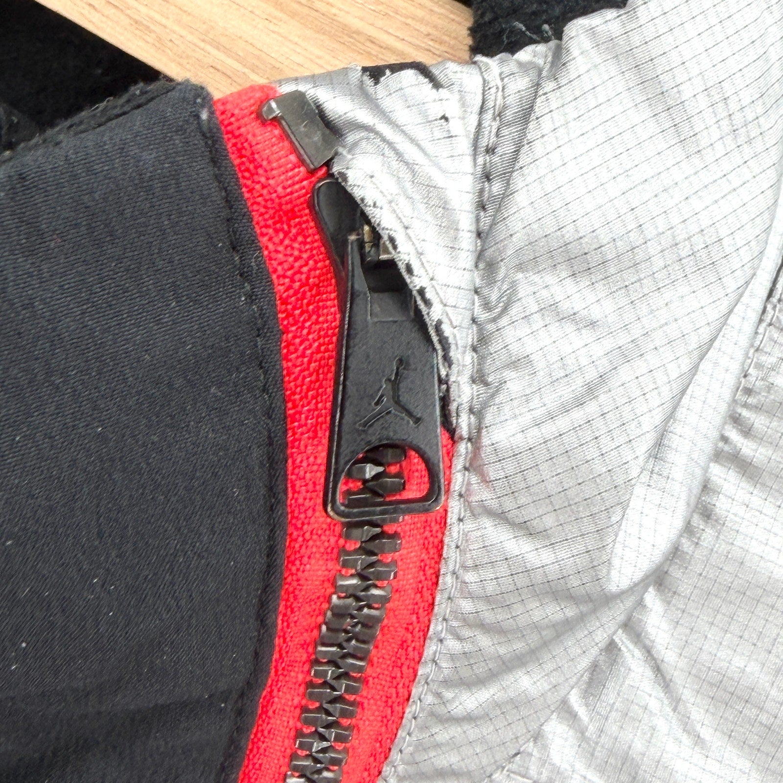 Air Jordan Black Silver Asymmetrical Zip Cropped Track Jacket