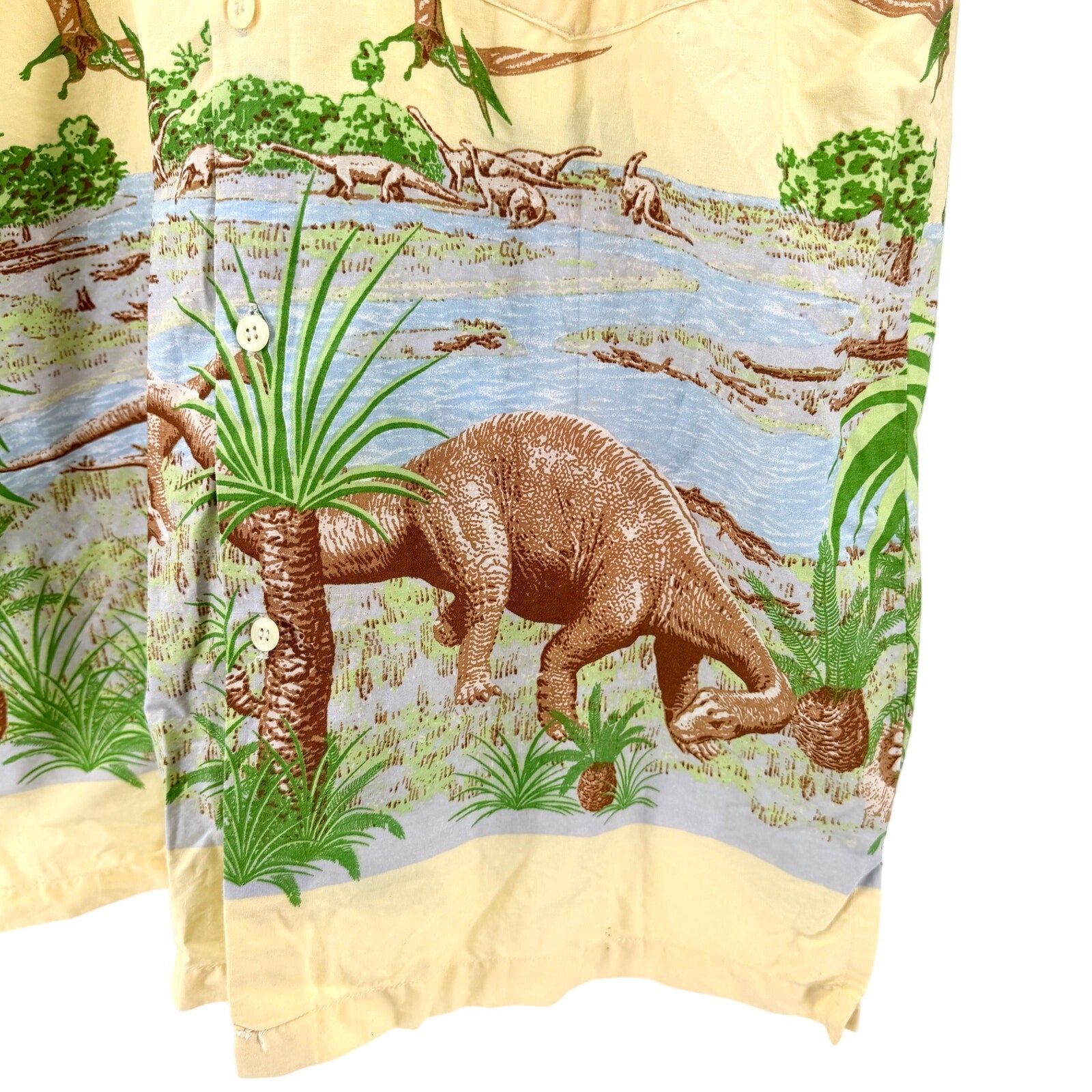 Vintage 90s Pastel Yellow 100% Cotton Dinosaur Border Print Short Sleeve Shirt