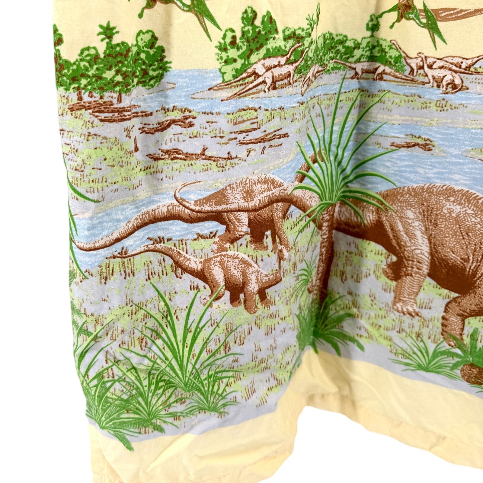 Vintage 90s Pastel Yellow 100% Cotton Dinosaur Border Print Short Sleeve Shirt